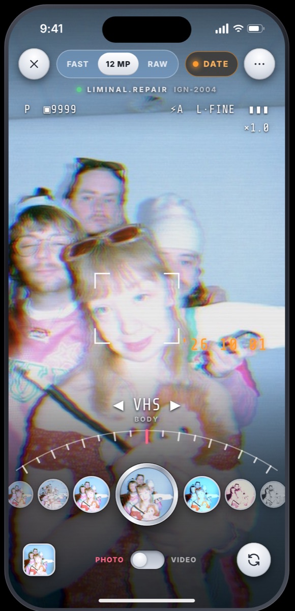 The camera shooting through VHS: chrome buttons, FAST 12 MP RAW, the date pill, the readout, and the wheel of looks around the shutter
